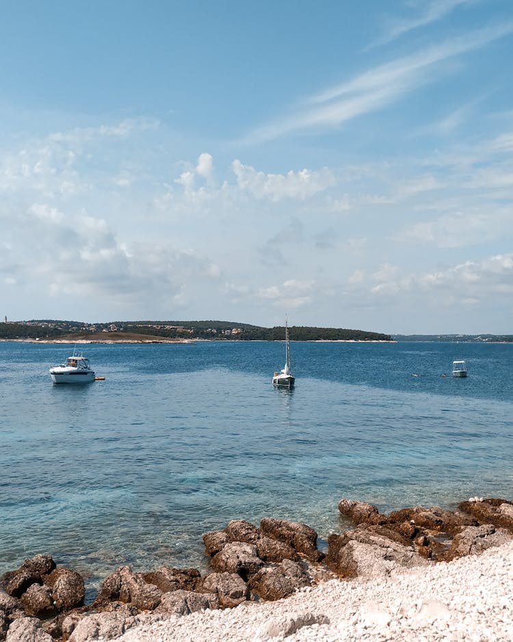 Boats Anchored On The Sea