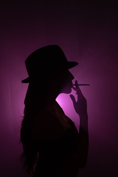 inhaled cigarette smoke inhaled cigarette smoke Portrait Young Woman French Inhaling Cigarette  Stock Photo 22444423