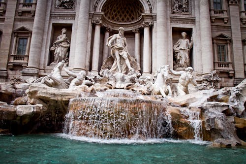 Water Fountain in Front of a Historical Building