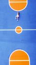Top view of sportswoman resting on bright ground for sport games after training