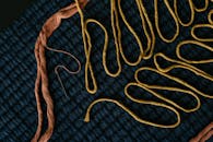 Yellow Thread on Blue Cloth