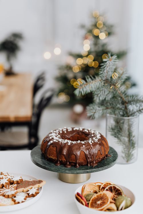 Free Delicious chocolate cake with holiday decor, perfect for festive celebrations. Stock Photo