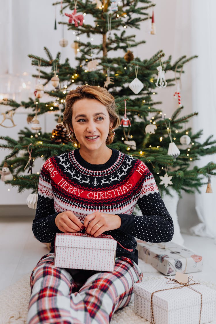 Photo Of A Woman With Christmas Gifts 