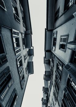 Black and white vertical shot of Solothurn's apartment buildings from a low angle.