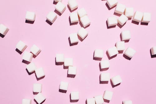 Kostenlos Kostenloses Stock Foto zu rosa hintergrund, süß, zuckerwürfel Stock-Foto