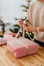 Woman Wrapping Box