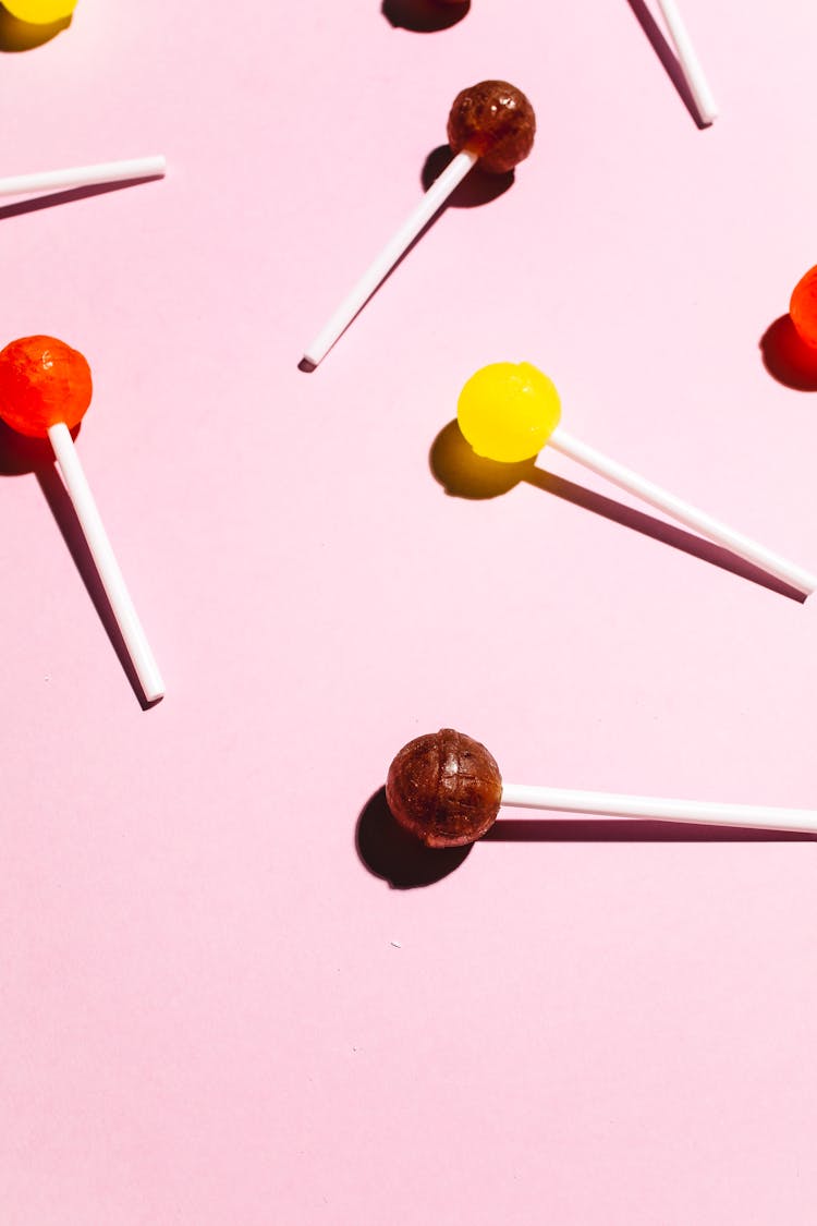 Lollipops On Light Pink Background