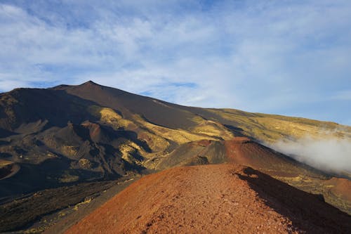 Free A Volcano Under White Clouds Stock Photo