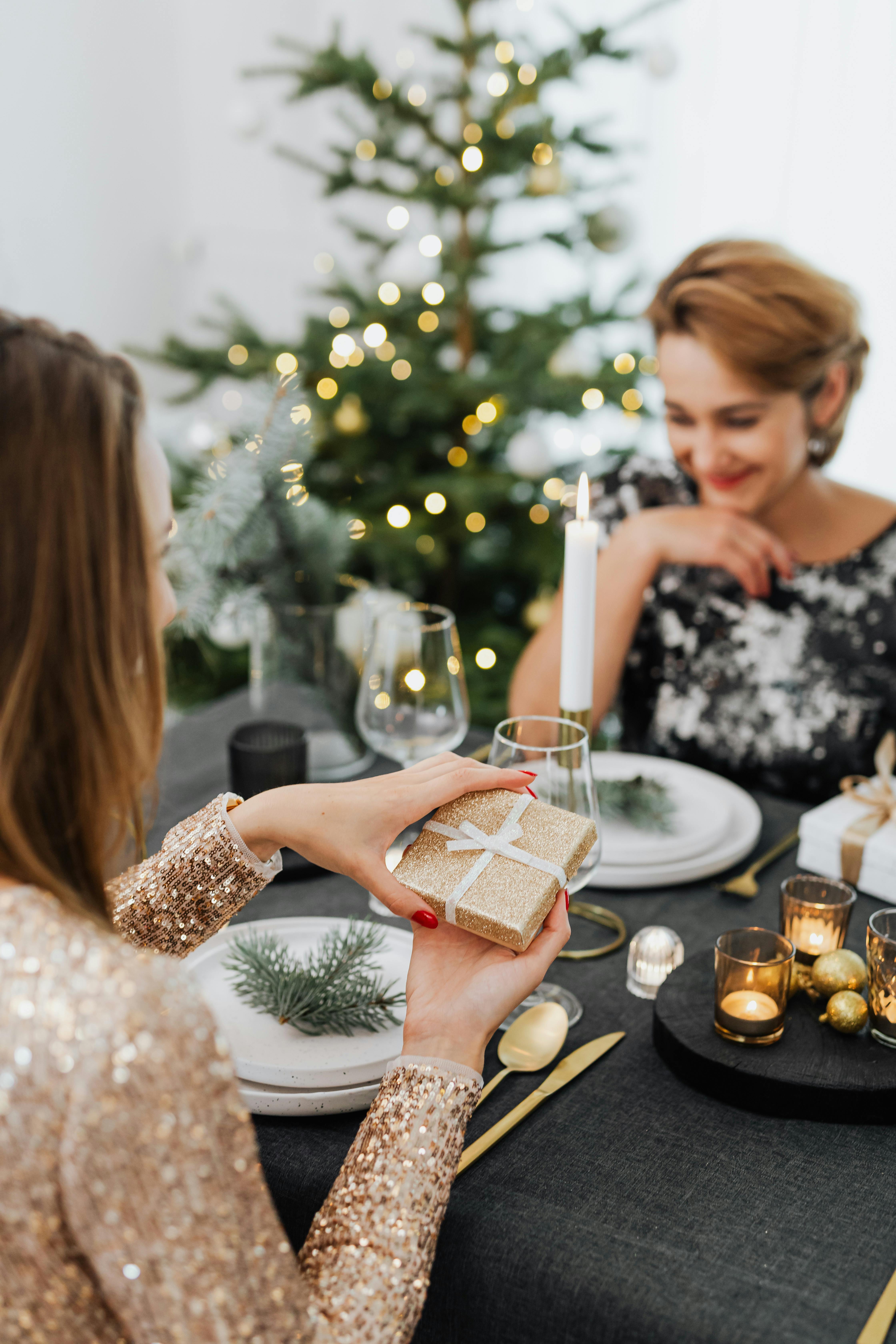 woman opening a gift box