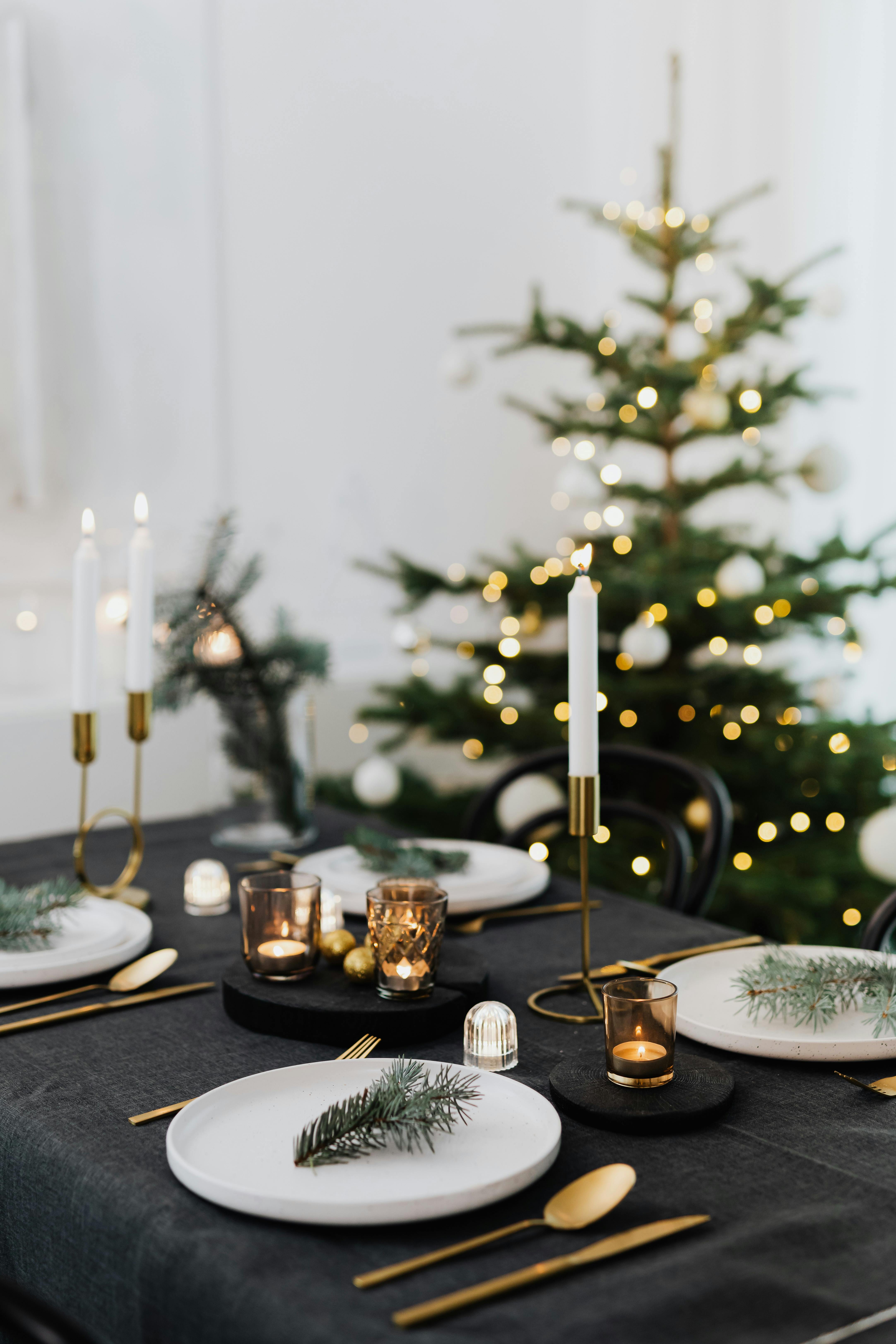 table set before christmas dinner