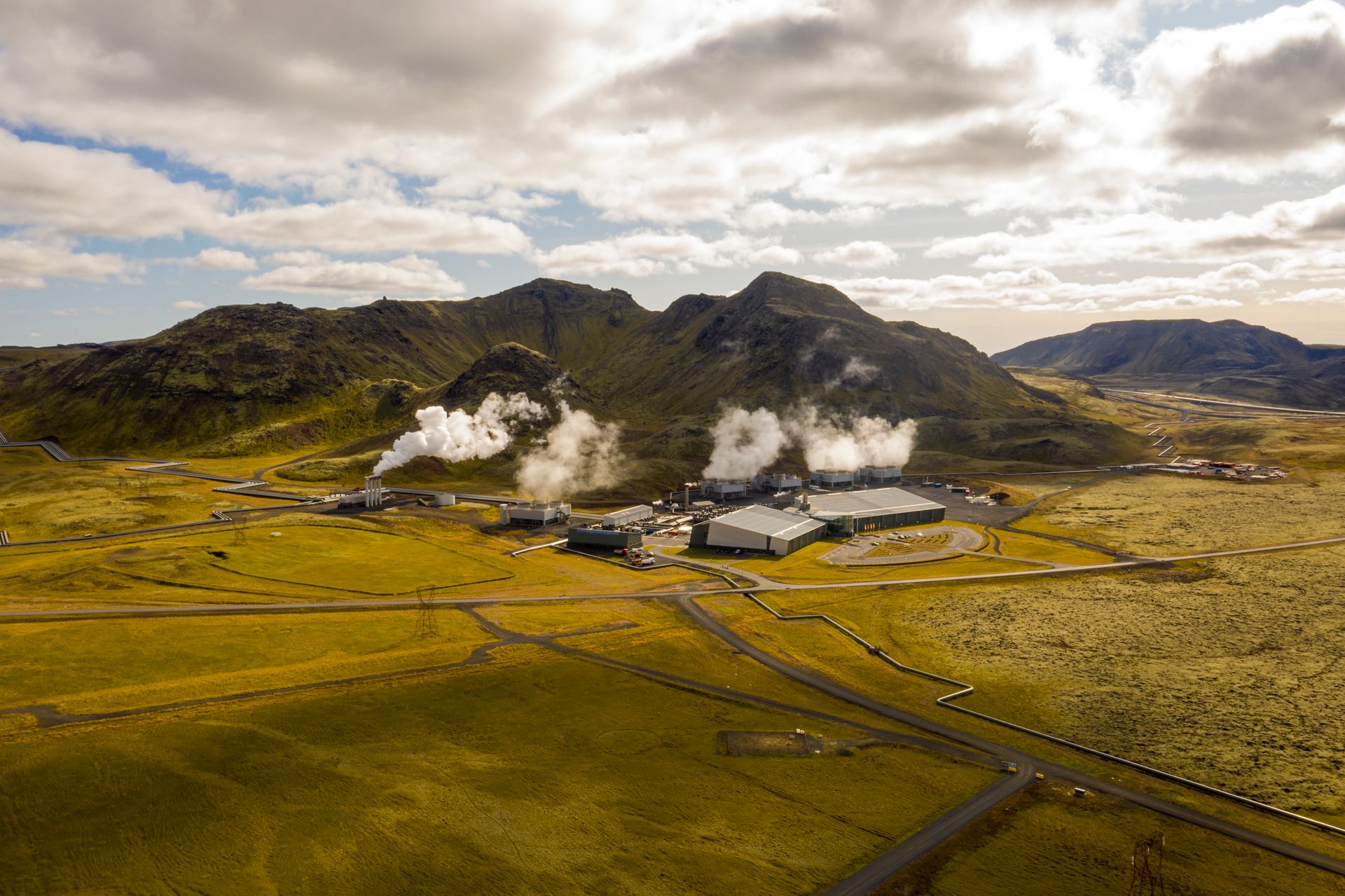 Hellisheidi Geothermal Power Plant on Grass Field Under a Cloudy Sky