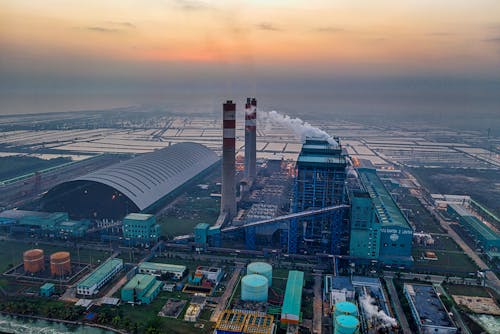 Aerial View of An Industrial Plant At Sunset