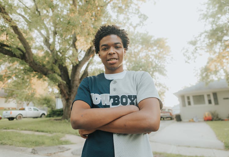 Photo Of A Man Wearing Baseball Jersey 