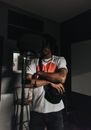 Man in White and Red Crew Neck T-shirt