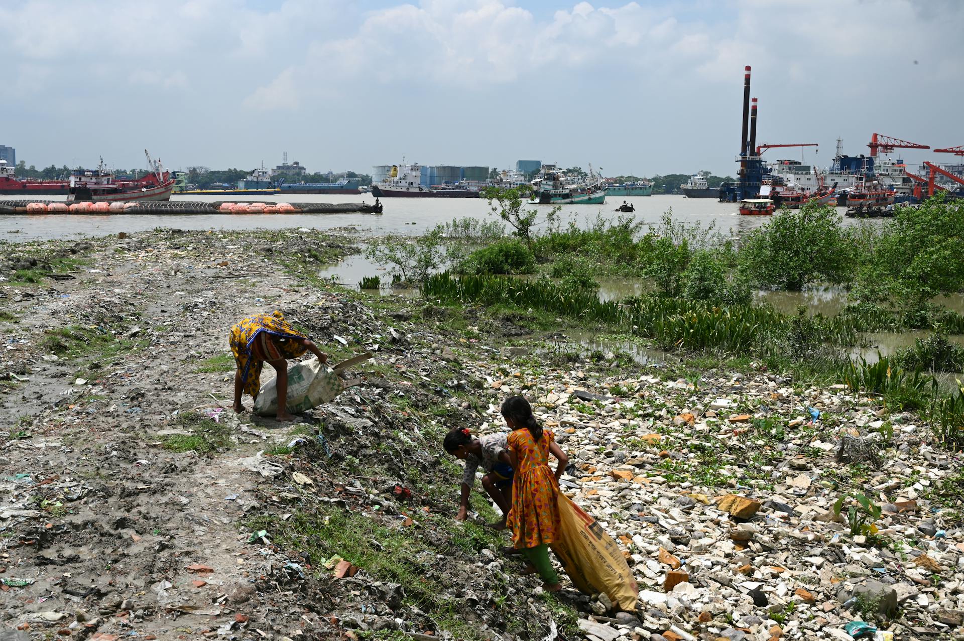 Garbage Collectors Picking Trash on the Street