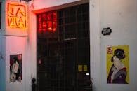 Door of old building with graffiti on walls