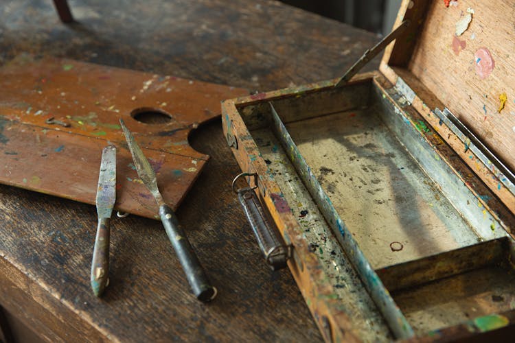 Old Spatula With Dirty Case In Workshop