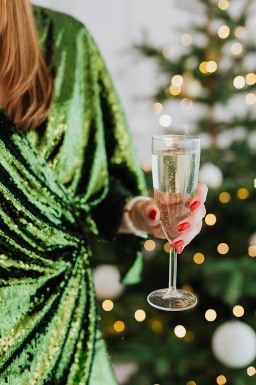 Person Holding a Glass of Wine