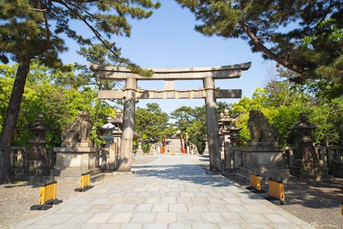 Free Ancient stone gate located near old temple in Japan Stock Photo