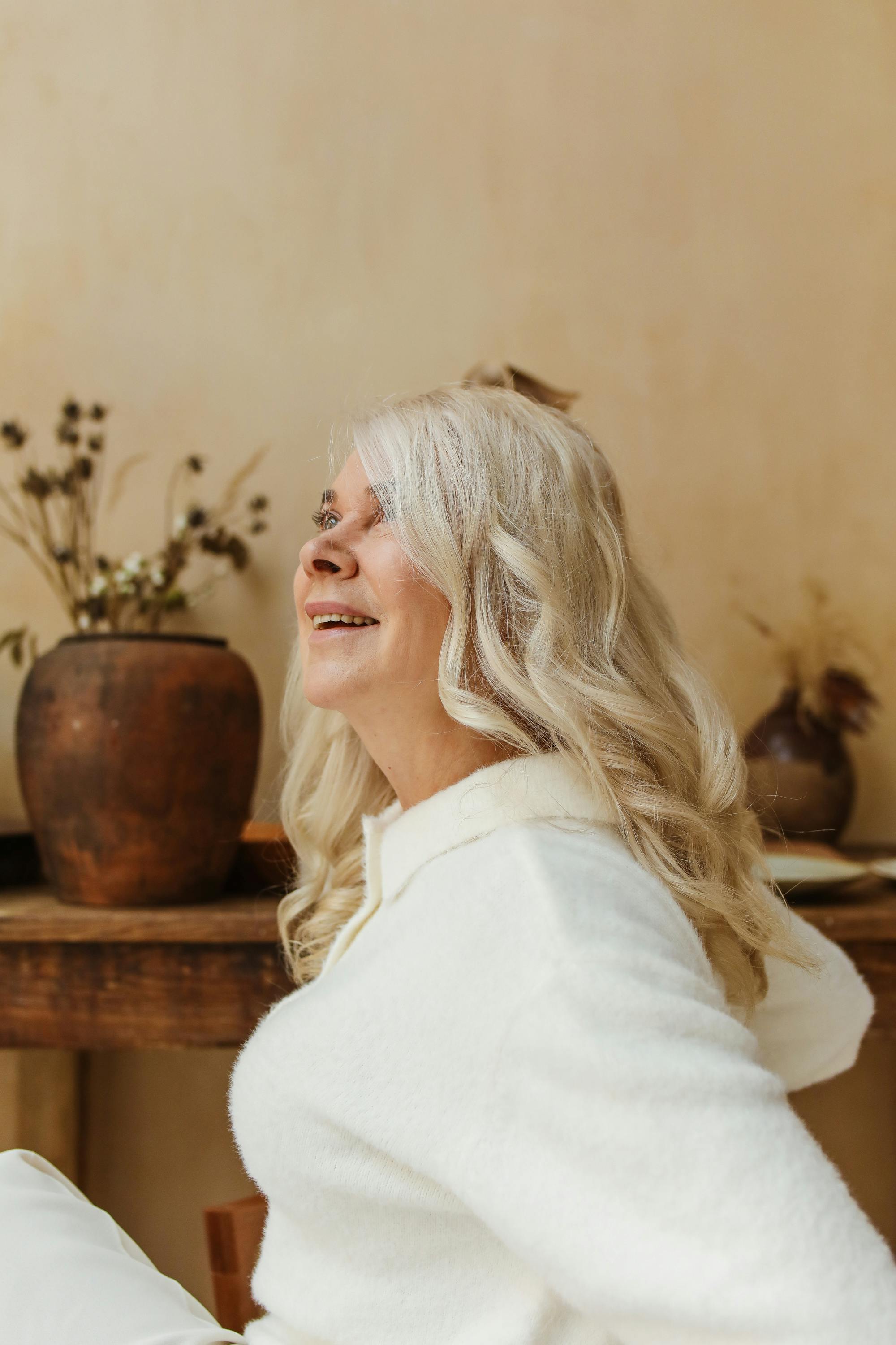 smiling elderly woman looking upwards