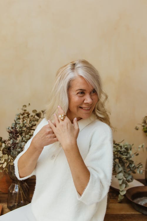 Free Smiling Elderly Woman Looking to Her Left Stock Photo
