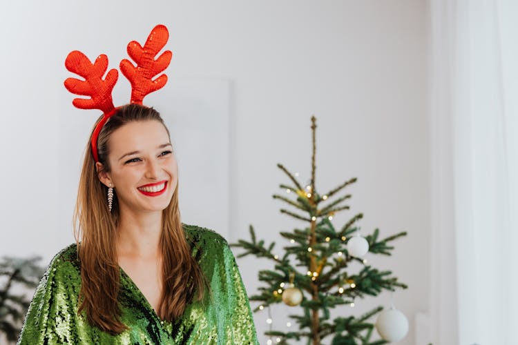 Pretty Woman Wearing A Reindeer Headband