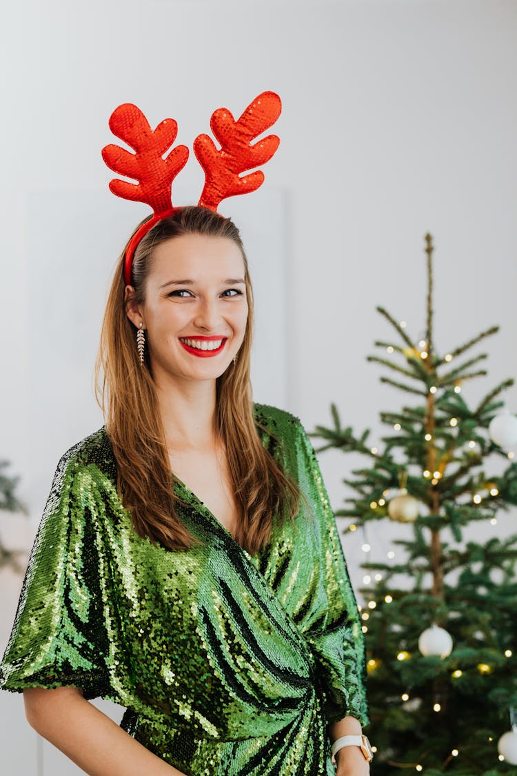 Pretty Woman Wearing A Reindeer Headband