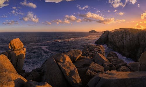 Free stock photo of beautiful sunset, calm sea, clouds