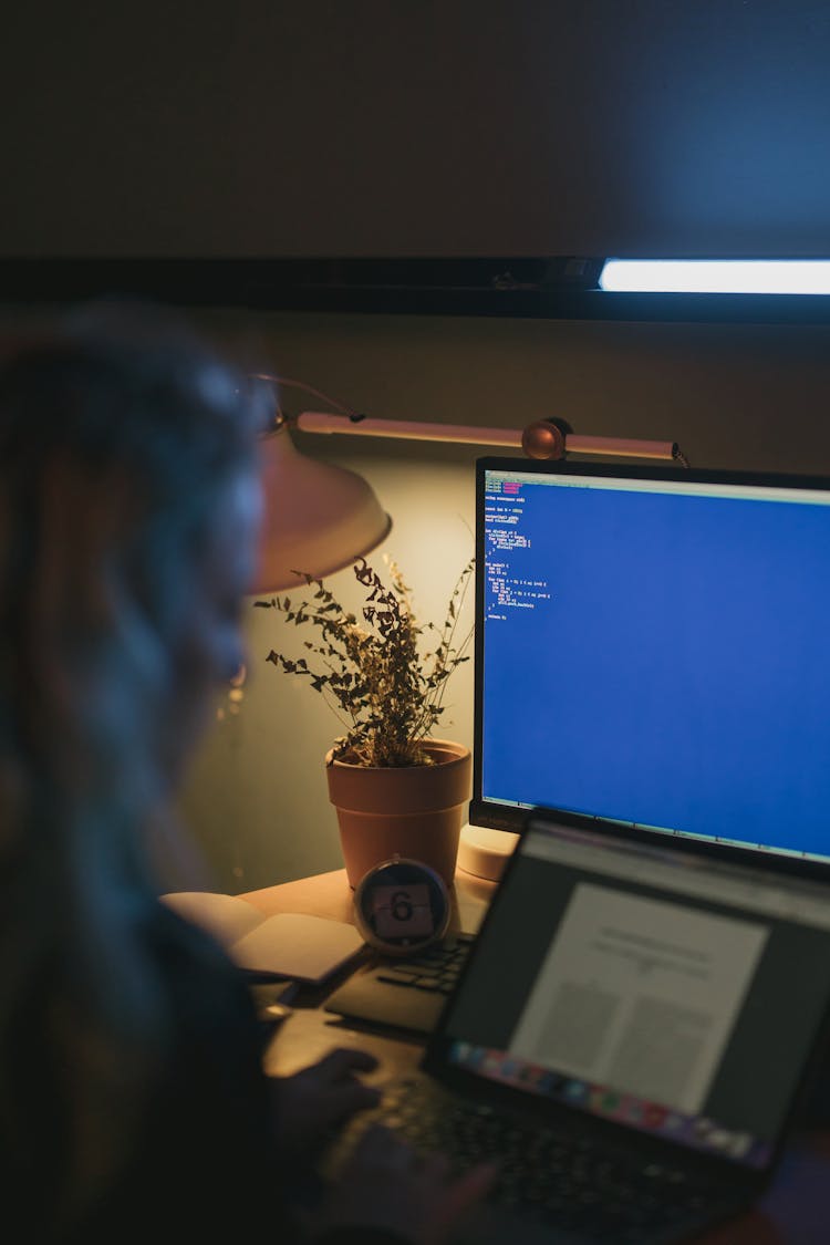 A Person Using A Computer