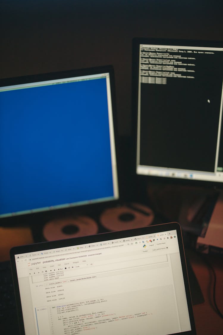 Close-Up Shot Of A Computer And A Laptop