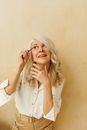 Woman in White Button Up Shirt Smiling