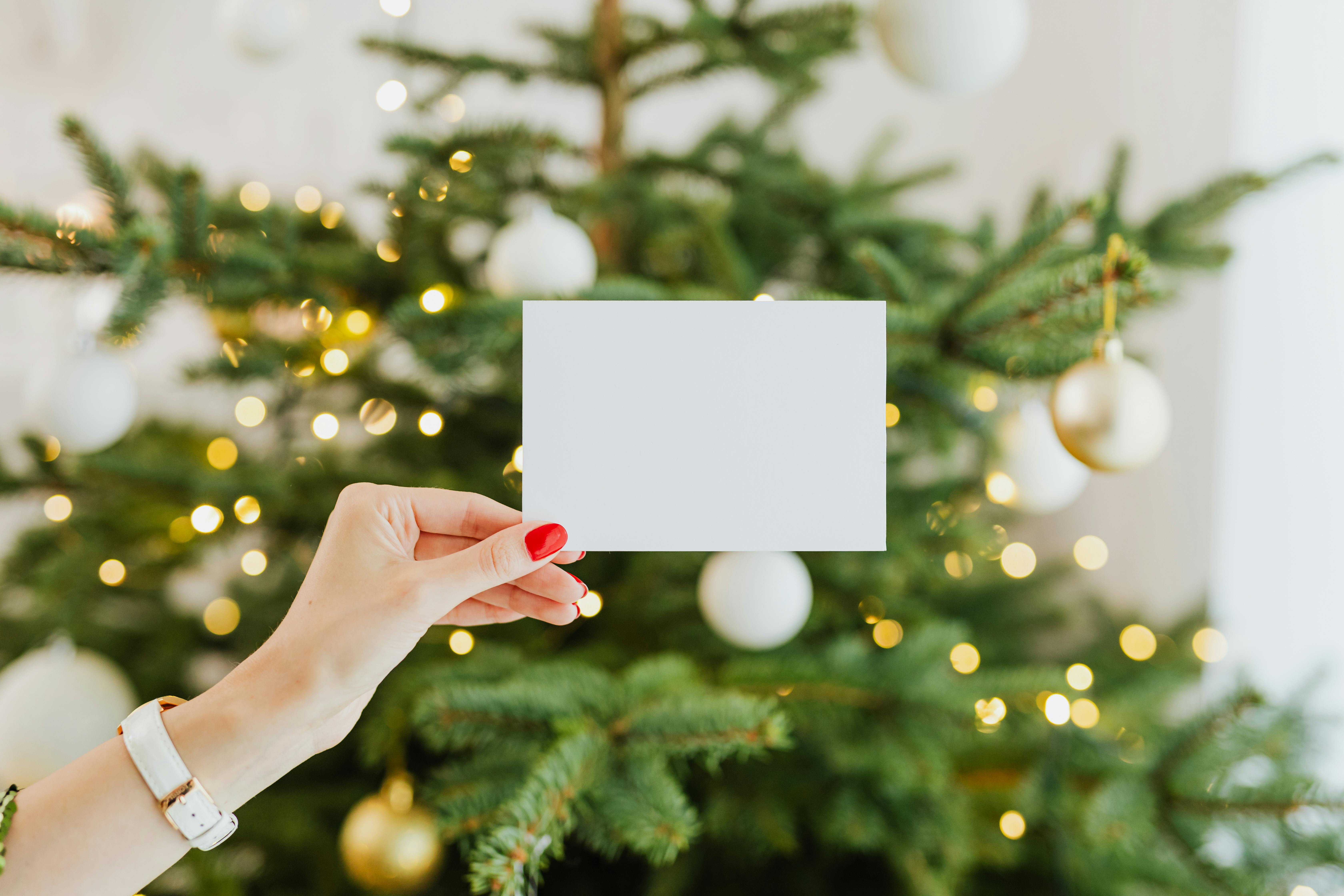 person holding a card