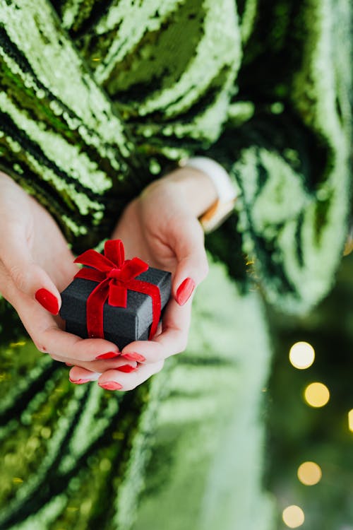 Free Person Holding Small Gift Box Stock Photo