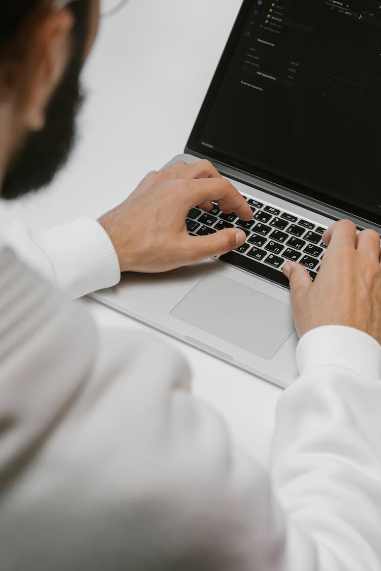 Man Using A Laptop