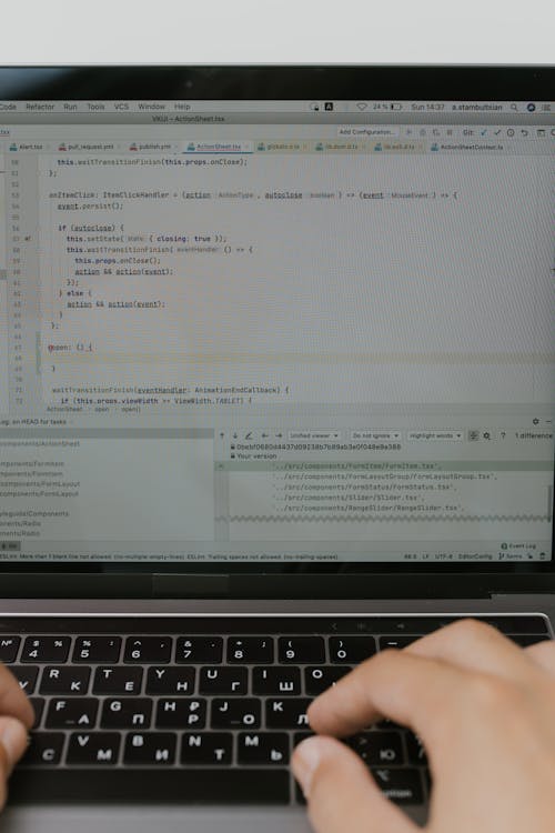 Close Up of a Hand on a Laptop Keyboard