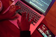 Close-Up Shot of a Person Using a Laptop