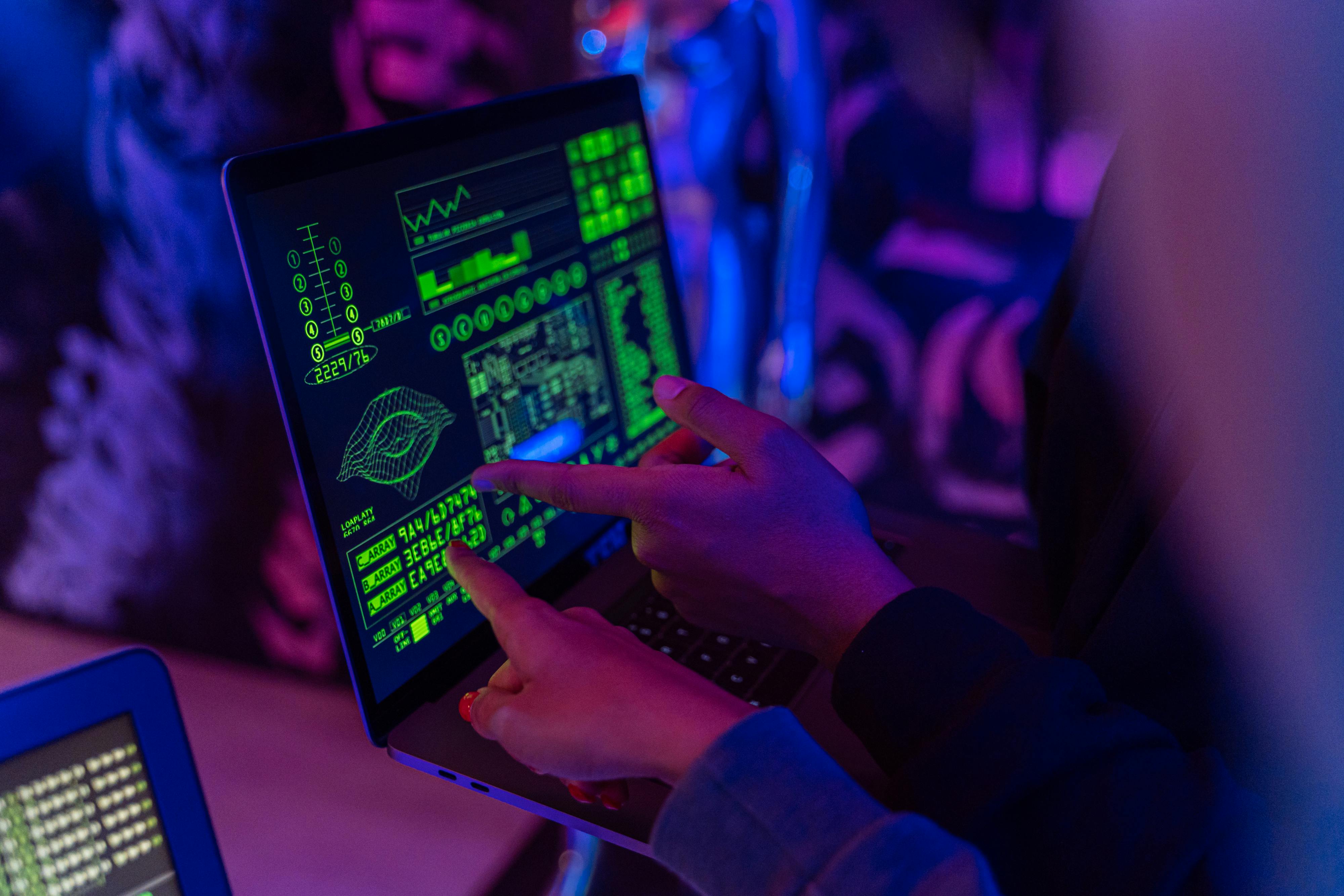 person holding black tablet computer