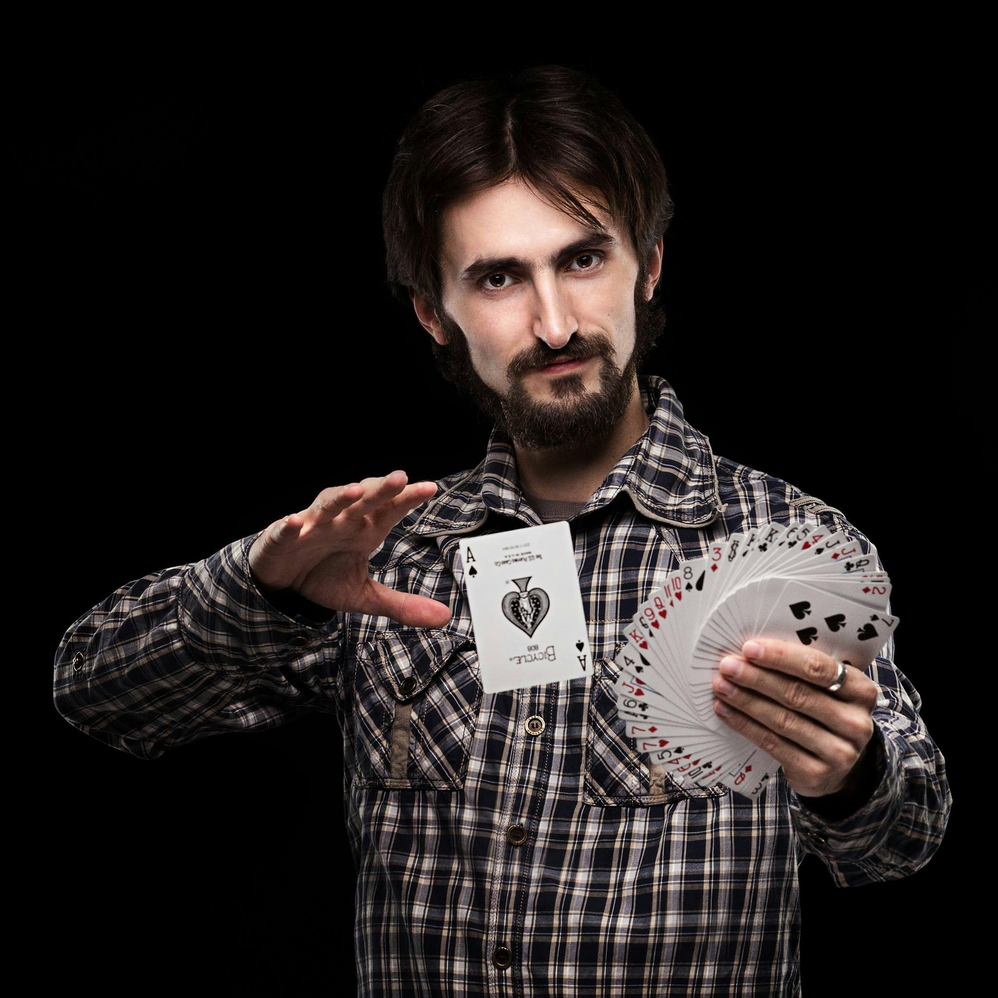 A person performing a card trick.