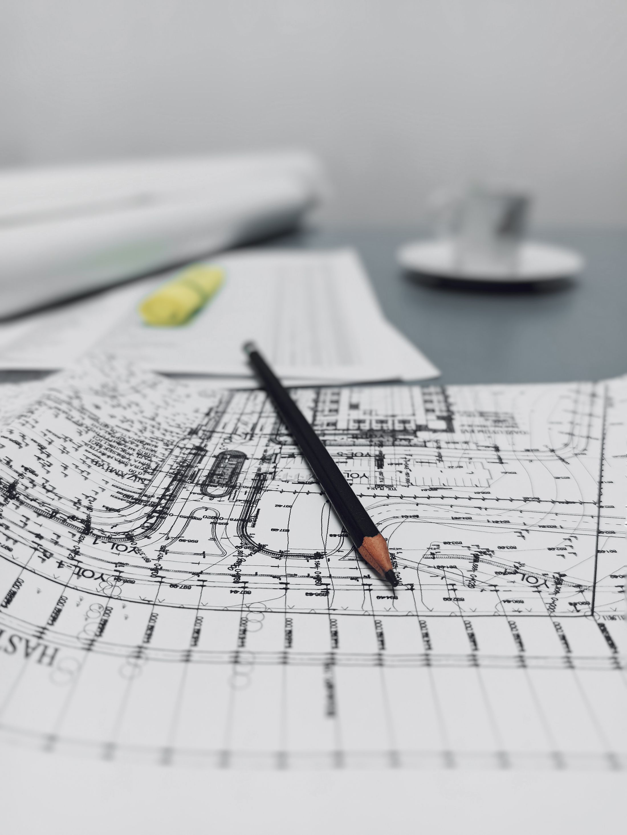 Building drawings with a pencil on a desk