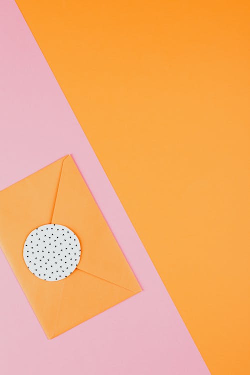 Orangle Envelope with a Dotted Circle Cutout 