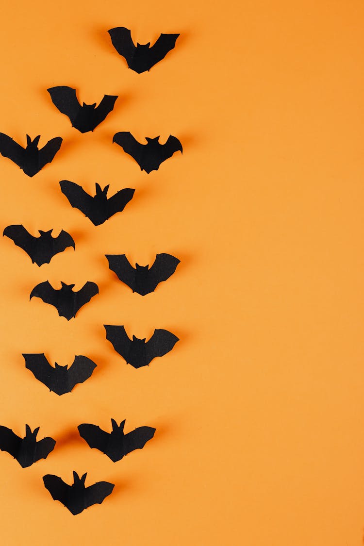 Paper Bats On Orange Background