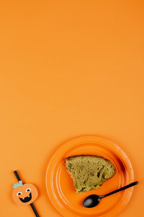 Bread on Orange Plate