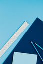White Ruler on Blue Surface