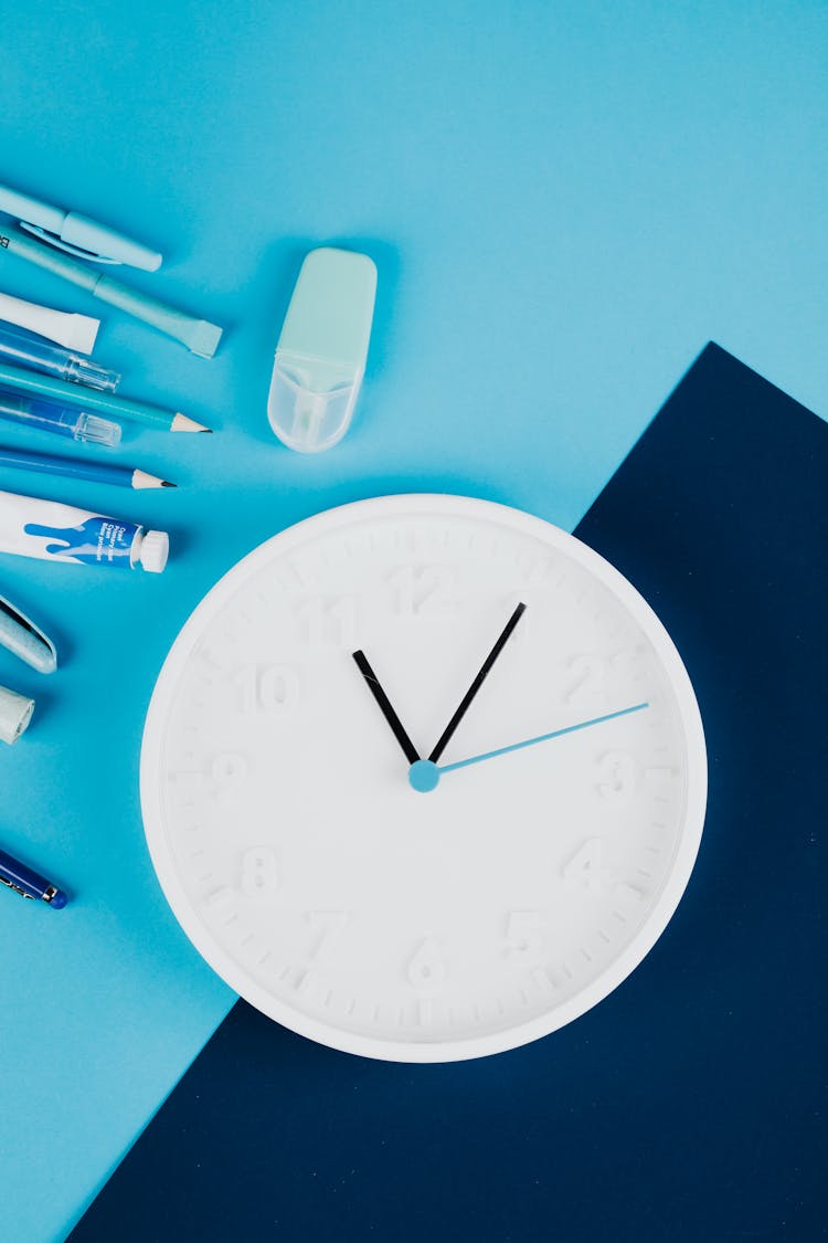 Analog Clock With Office Supplies