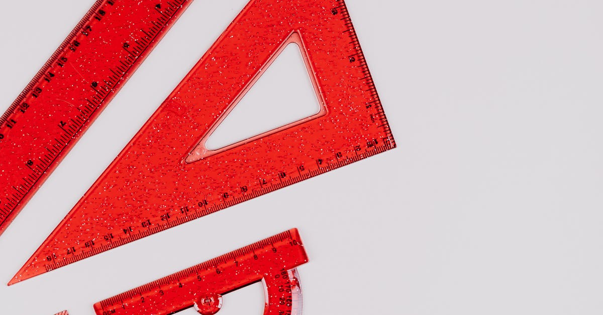 Red Rulers on White Background · Free Stock Photo