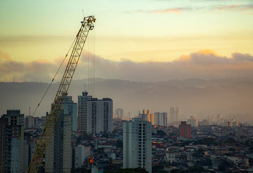 Free Yellow Crane Used in Building construction Stock Photo
