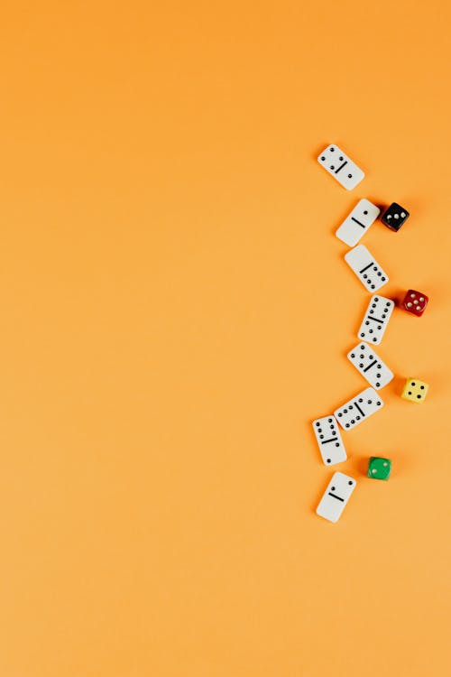 Dominoes and Dices over Orange Surface