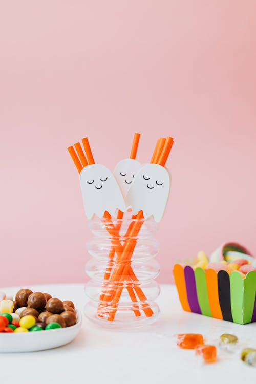 Free Halloween Candy and Decorated Straws Stock Photo