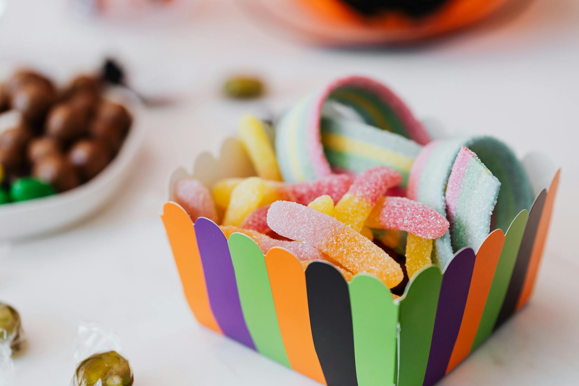 Sugar Coated Candies in a Striped Box