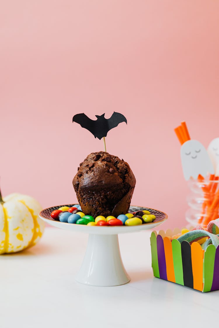 Paper Bat On Chocolate Muffin And Other Sweets 